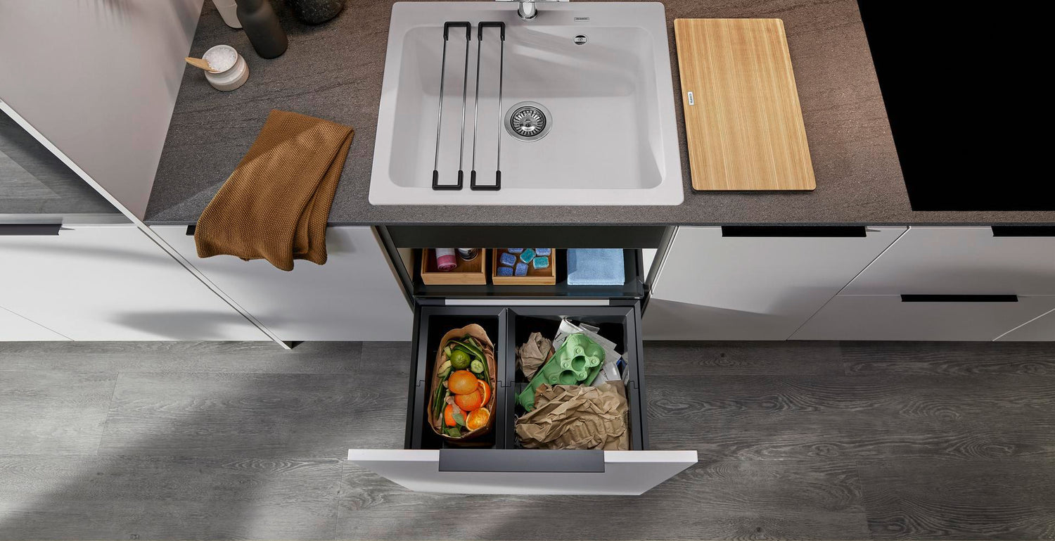 Blanco waste sorting system in white kitchen