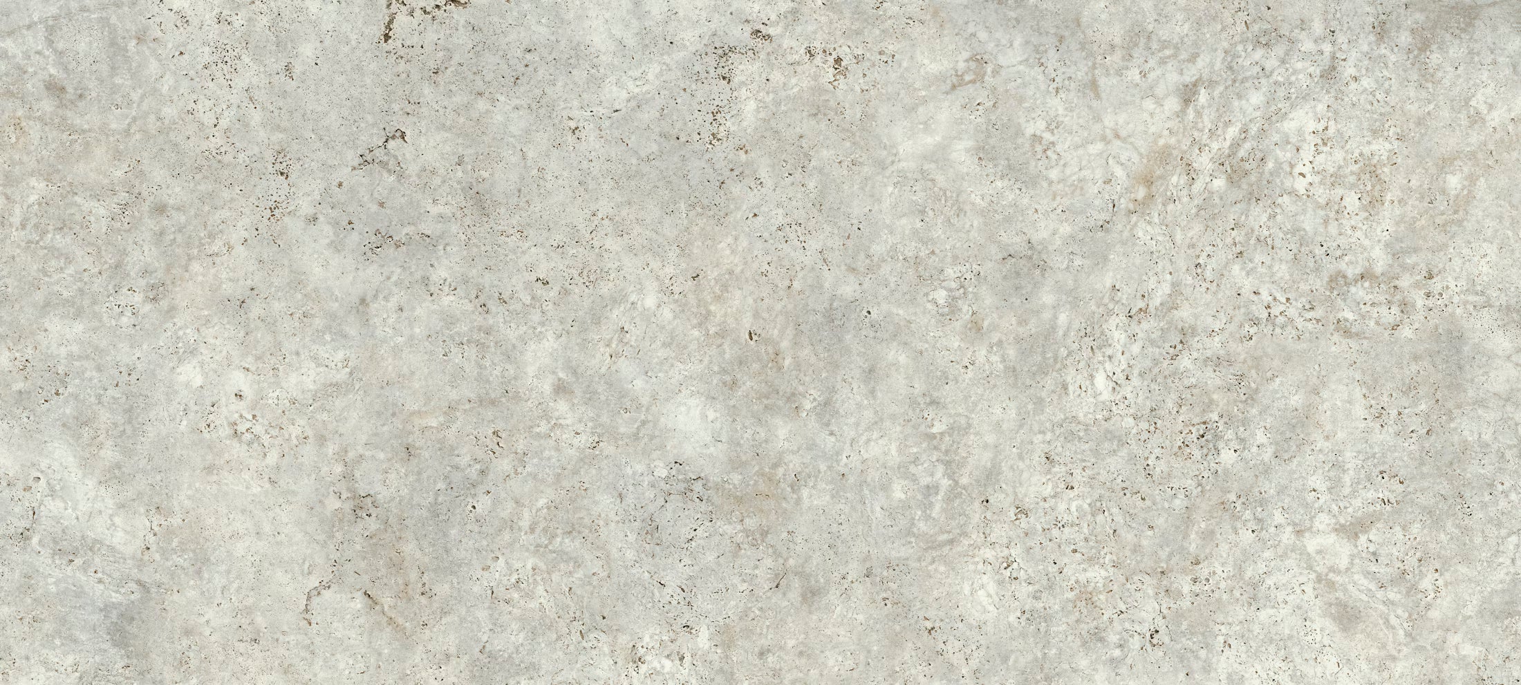 Close-up of a gray stone surface with subtle variations in color.