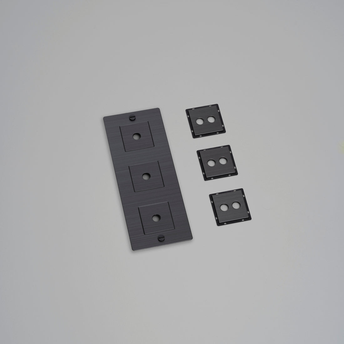Buster + Punch 3G wall plate, vertical, with infills, smoked bronze