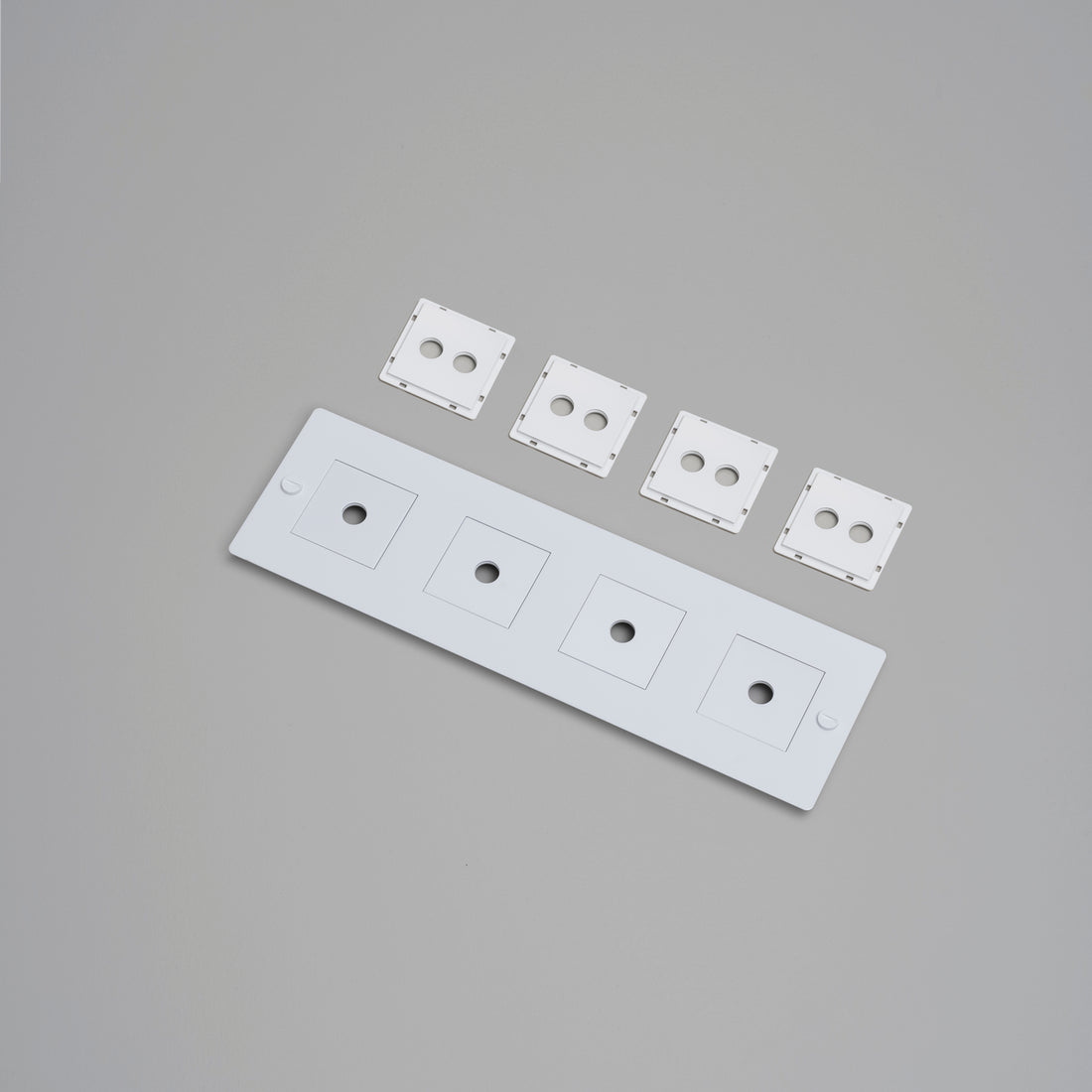 Buster + Punch white horizontal 4G wall plate with infills