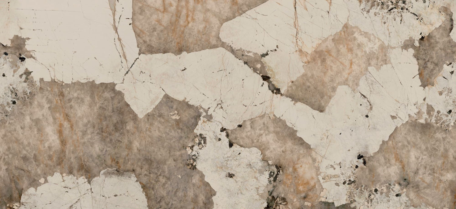 Close-up of a textured stone surface with beige and brown tones