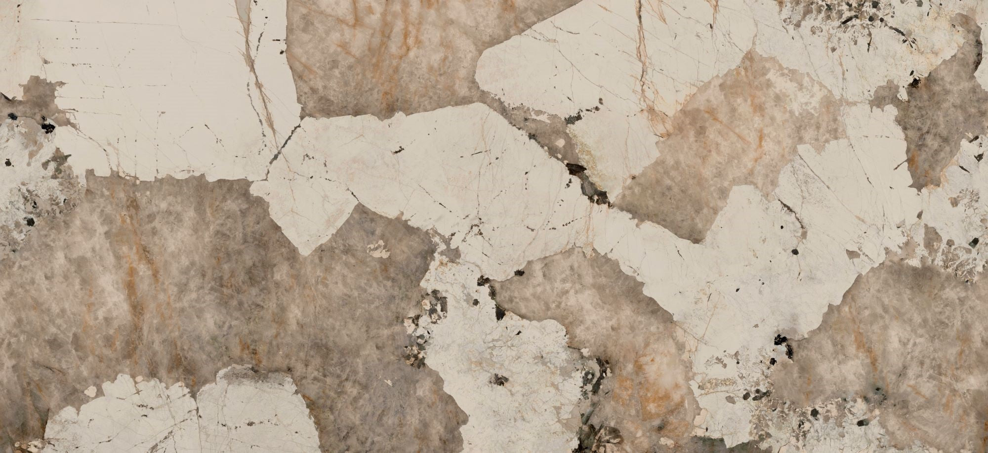 Close-up of a textured stone surface with beige and brown tones