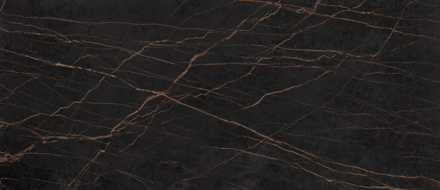 Dekton laurent worktop is dark with visible golden veins