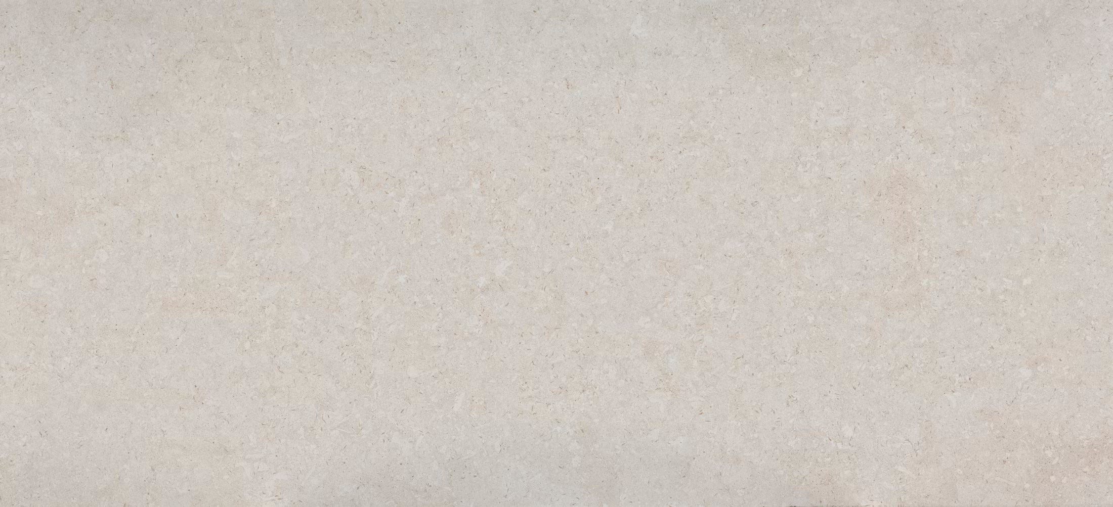 White creamy base Dekton Nebbie worktop dotted warm taupe hues