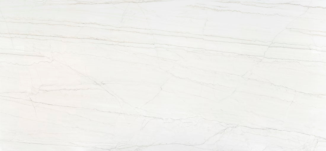 Dekton Neural - A light cream-toned base with fine, pale veins that run through the marbling