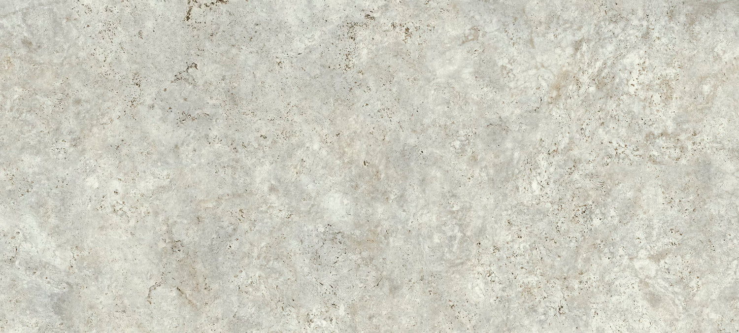 Close-up of a gray stone surface with subtle variations in color.