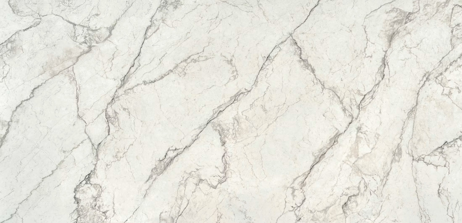 White marble-look tile with elegant gray and beige veining across the surface.