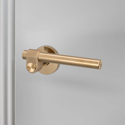 Buster + Punch Cast sprung door handle set in brass – view 1