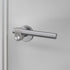 Buster + Punch Cast sprung door handle set in steel – view 1