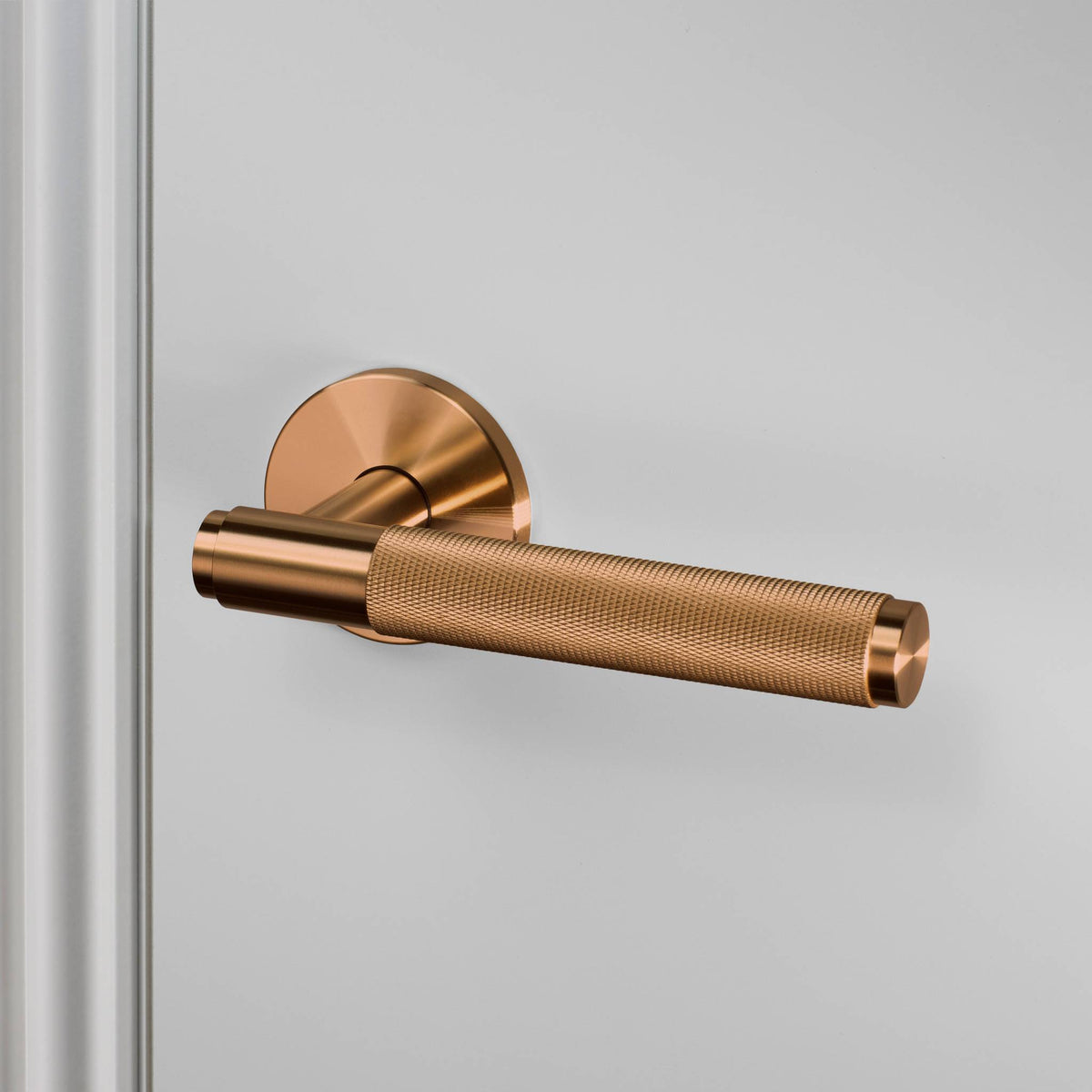 Buster + Punch door handle set / cross / sprung – warm sunset