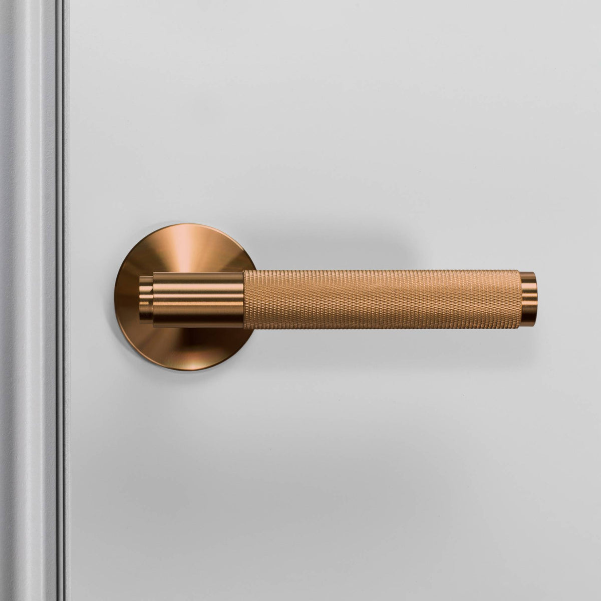 Buster + Punch door handle set / cross / sprung – warm sunset