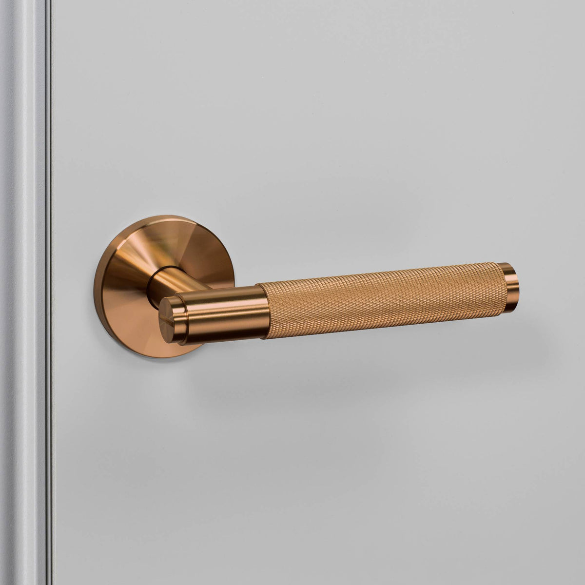 Buster + Punch door handle set / cross / sprung – warm sunset