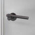 Buster + Punch Cast sprung door handle set in smoked bronze – view 1