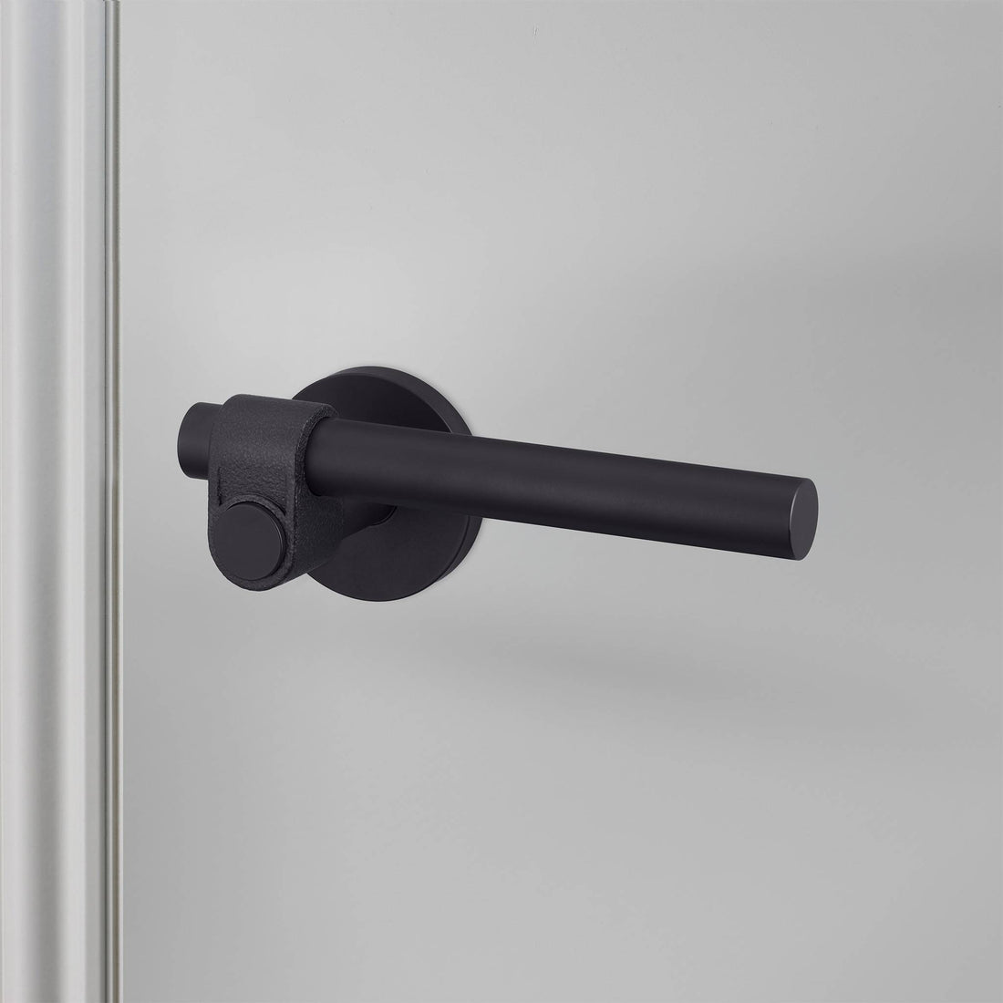 Buster + Punch Cast sprung door handle set in welders black – view 1