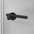 Buster + Punch Cast sprung door handle set in welders black – view 1
