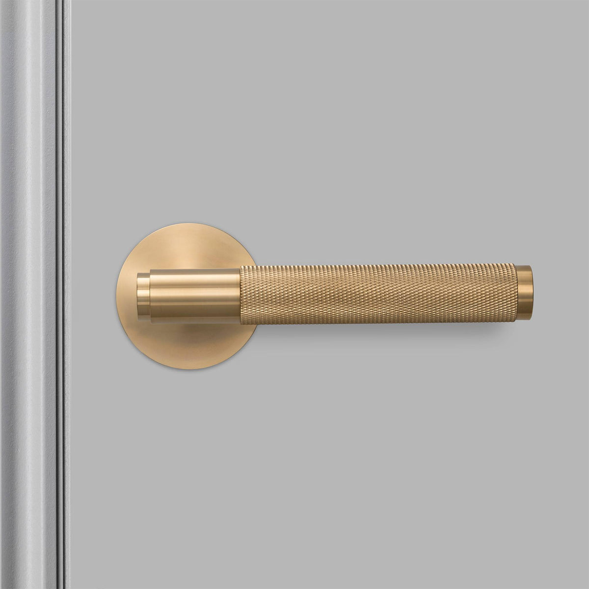Buster + Punch door handle set / cross / swe / sprung – brass