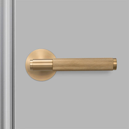 Buster + Punch door handle set / cross / swe / sprung – brass