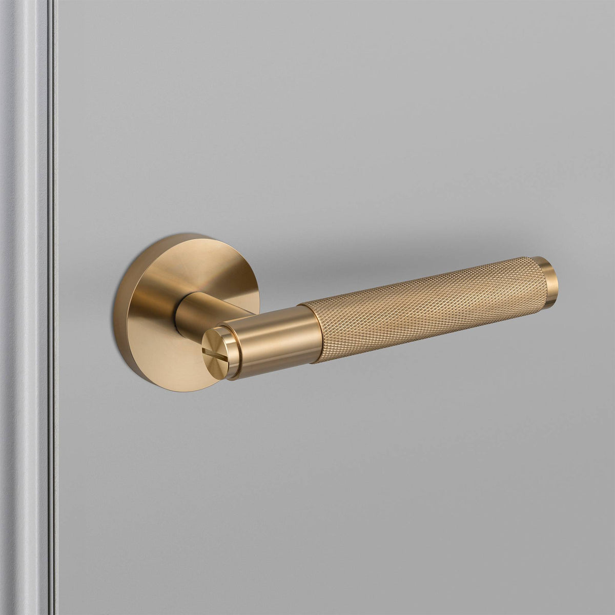Buster + Punch door handle set / cross / swe / sprung – brass