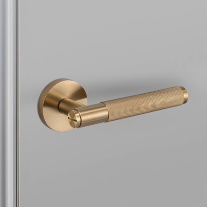 Buster + Punch door handle set / cross / swe / sprung – brass