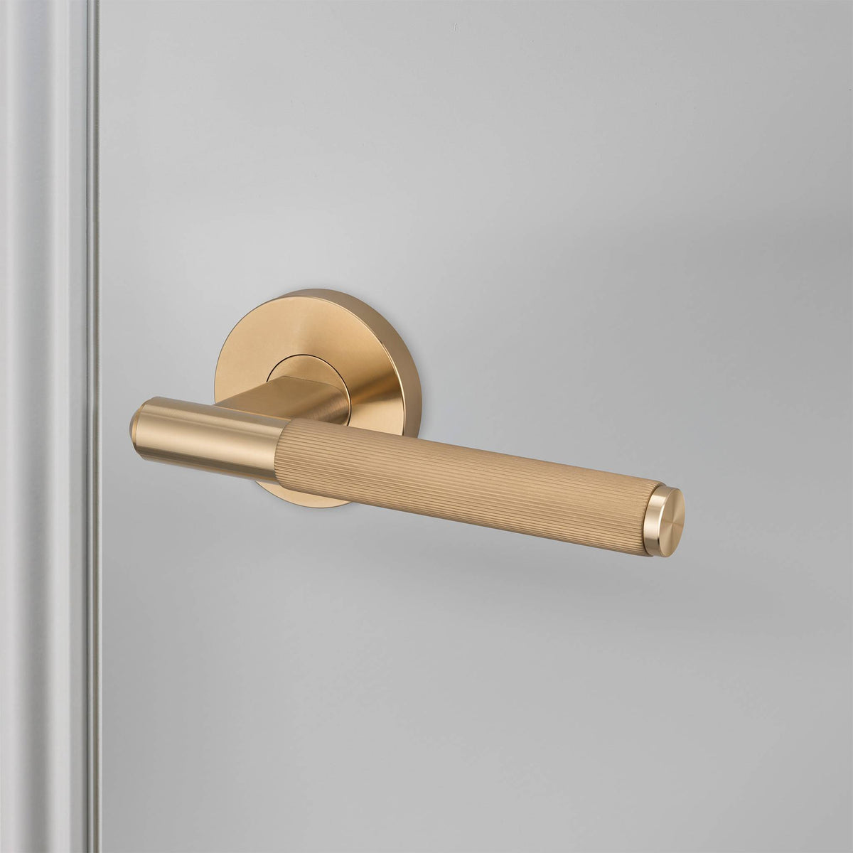 Buster + Punch door handle set / linear / swe / sprung – brass