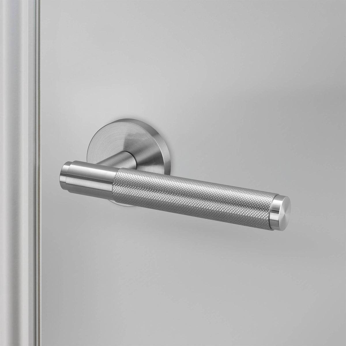 Buster + Punch door handle set / cross / swe / sprung – steel