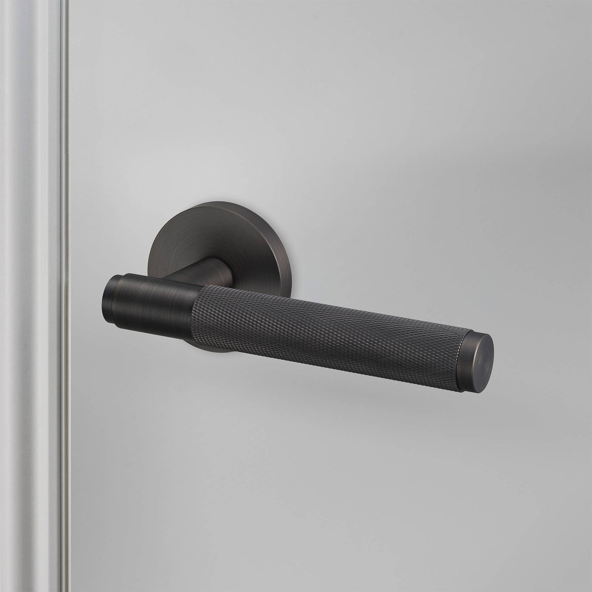 Buster + Punch door handle set / cross / swe / sprung – smoked bronze