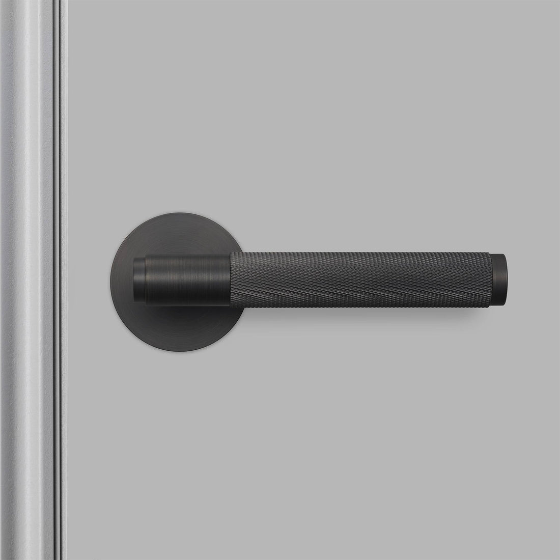 Buster + Punch door handle set / cross / swe / sprung – smoked bronze
