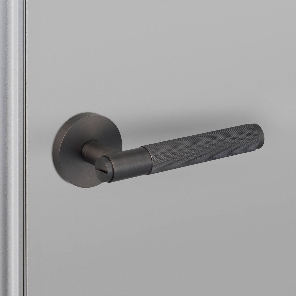 Buster + Punch door handle set / cross / swe / sprung – smoked bronze