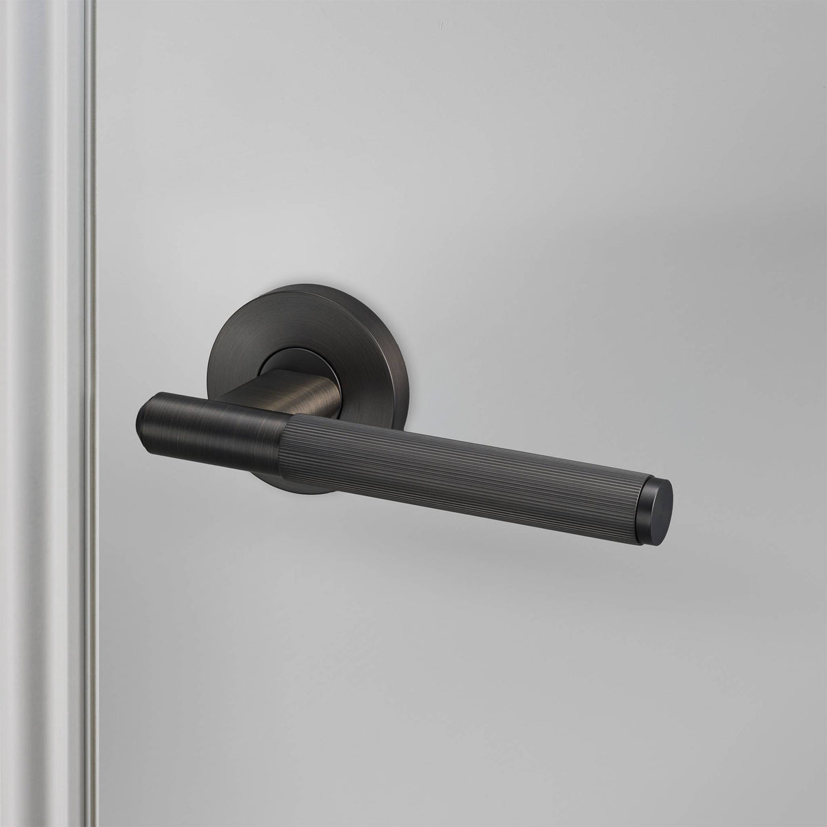 Buster + Punch door handle set / linear / swe / sprung – smoked bronze