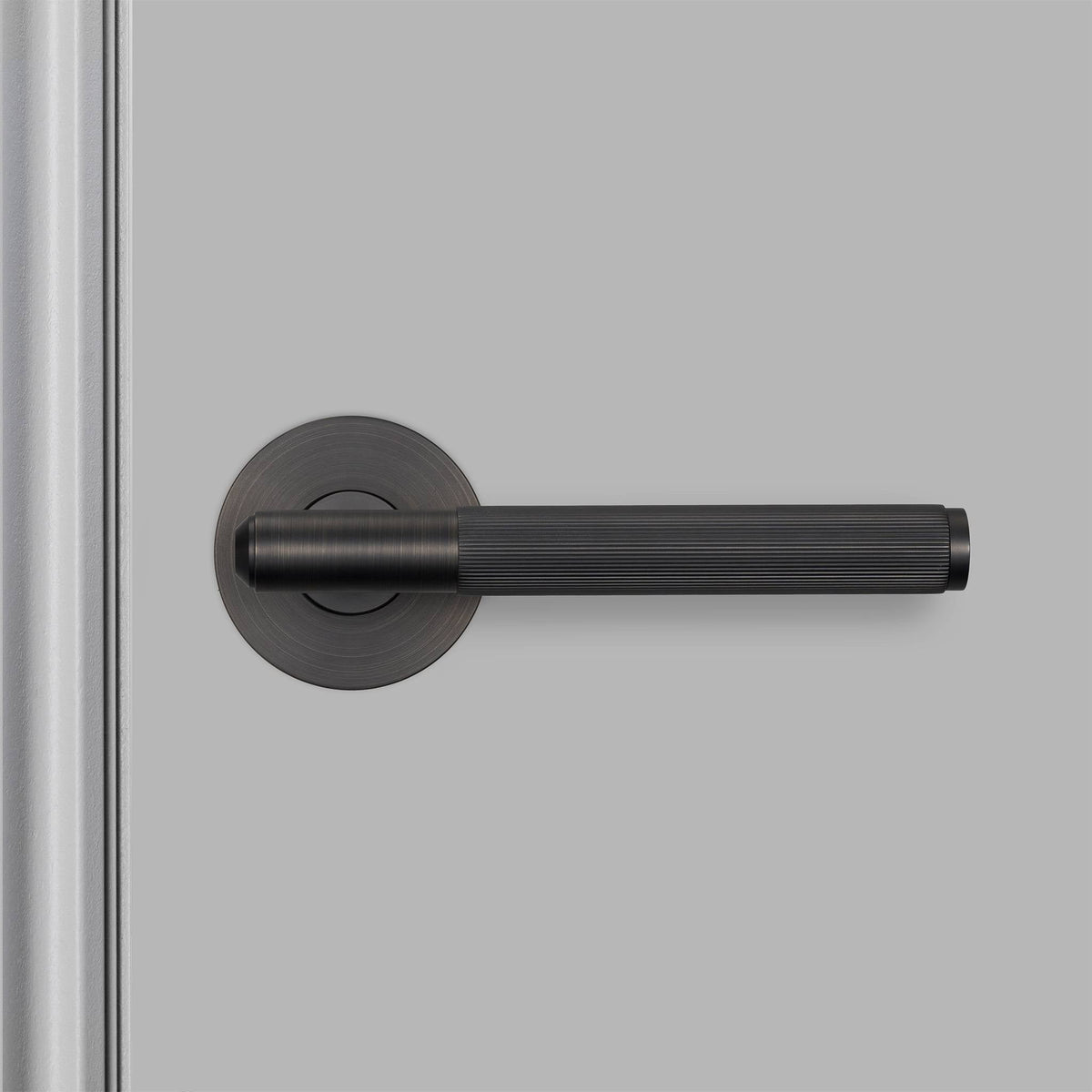 Buster + Punch door handle set / linear / swe / sprung – smoked bronze