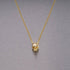 Skull necklace / Travis Barker – Gold